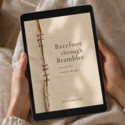 Lifestyle image of the digital PDF edition of Barefoot Through Brambles by Julia Delaney displayed on an iPad